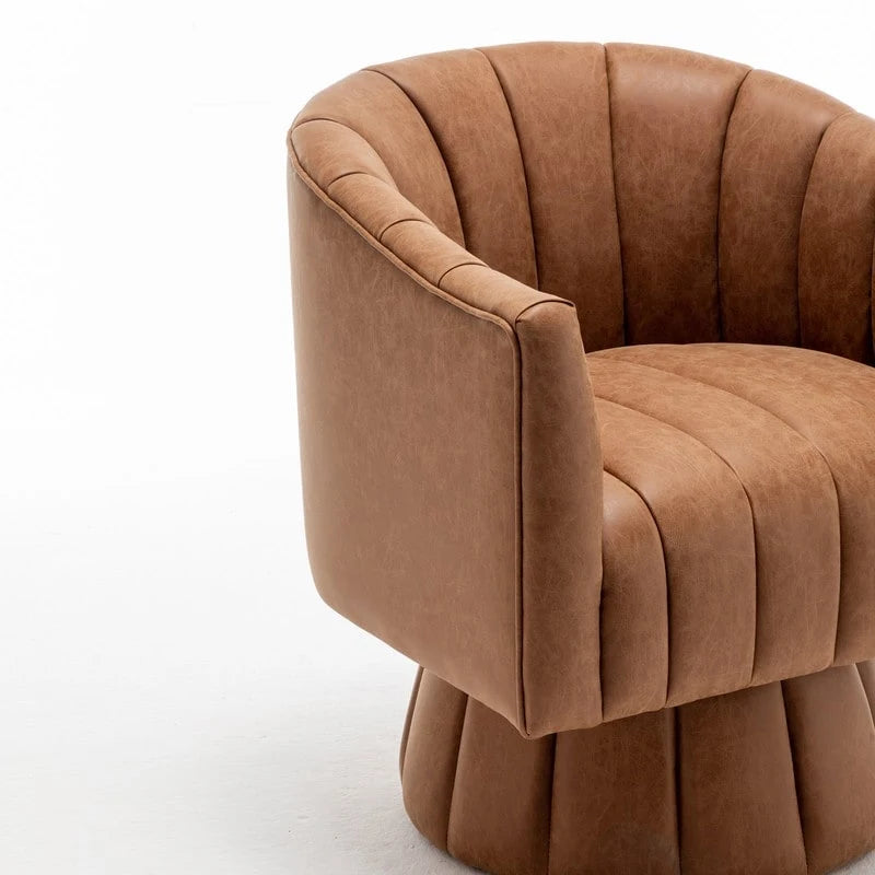 Fauteuil pivotant SEYNAR style milieu du siècle, en cuir PU capitonné, forme tonneau.