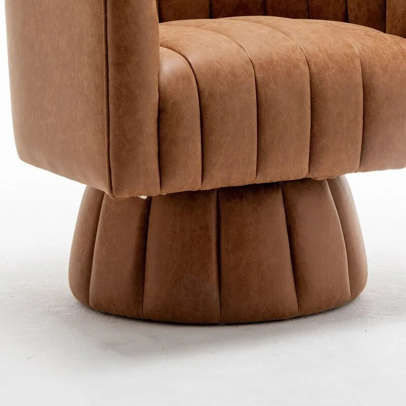 Fauteuil pivotant SEYNAR style milieu du siècle, en cuir PU capitonné, forme tonneau.