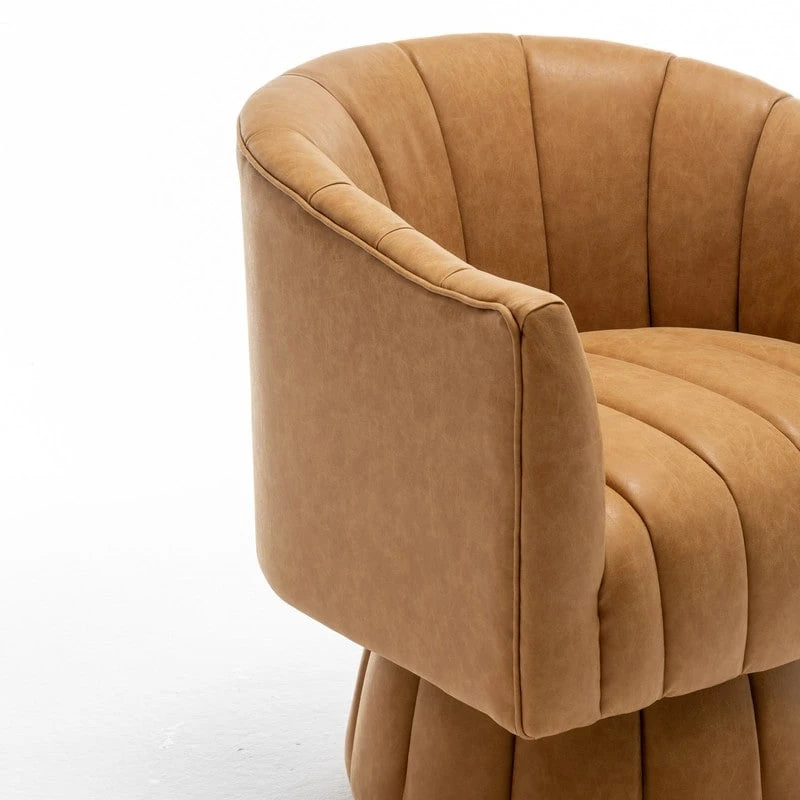 Fauteuil pivotant SEYNAR style milieu du siècle, en cuir PU capitonné, forme tonneau.