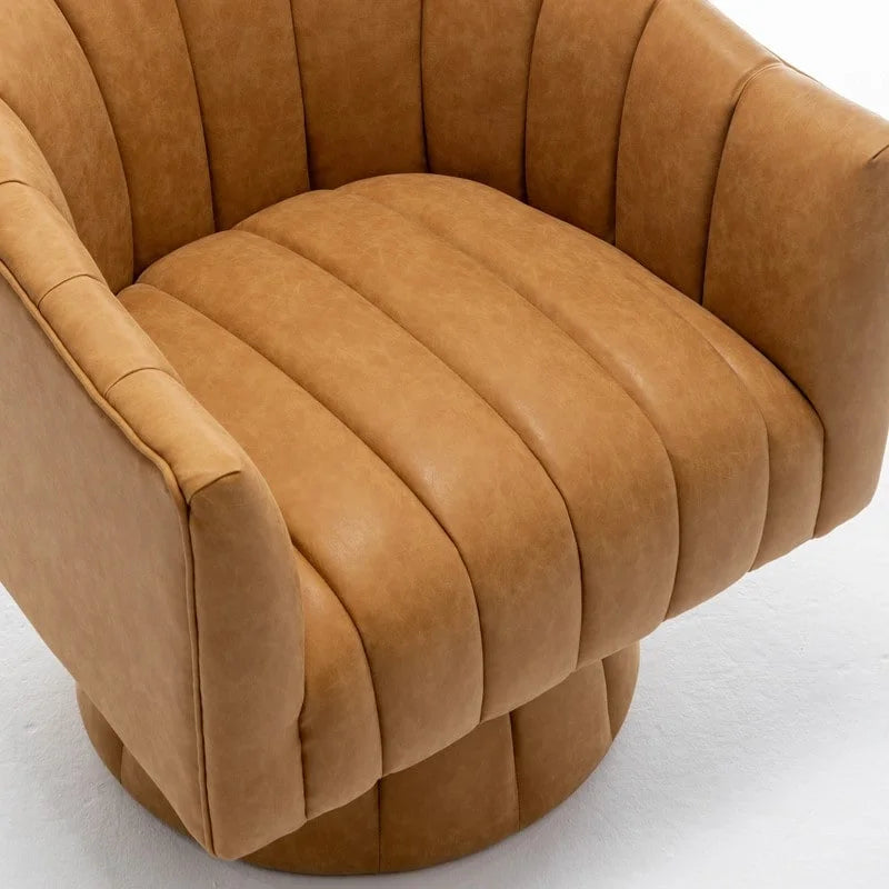 Fauteuil pivotant SEYNAR style milieu du siècle, en cuir PU capitonné, forme tonneau.