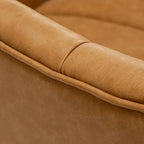 Fauteuil pivotant SEYNAR style milieu du siècle, en cuir PU capitonné, forme tonneau.