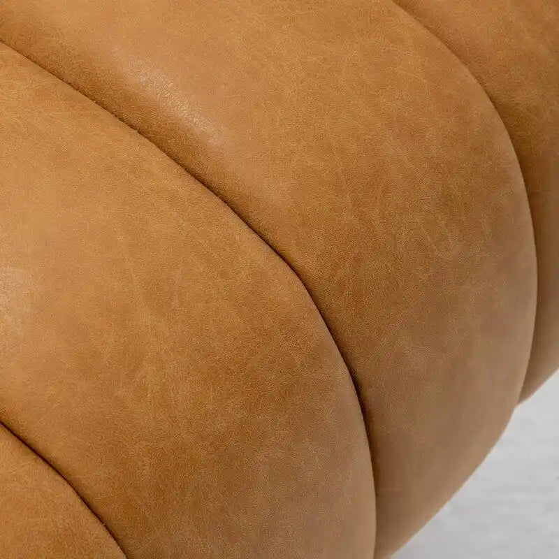 Fauteuil pivotant SEYNAR style milieu du siècle, en cuir PU capitonné, forme tonneau.