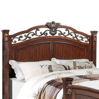 Lit en bois avec tête de lit travaillée en merisier foncé