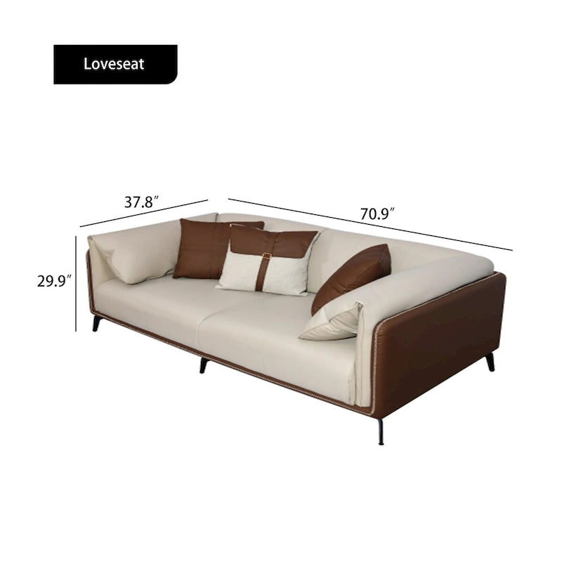 Canapé deux places avec accoudoirs rembourrés en similicuir et coussins réversibles