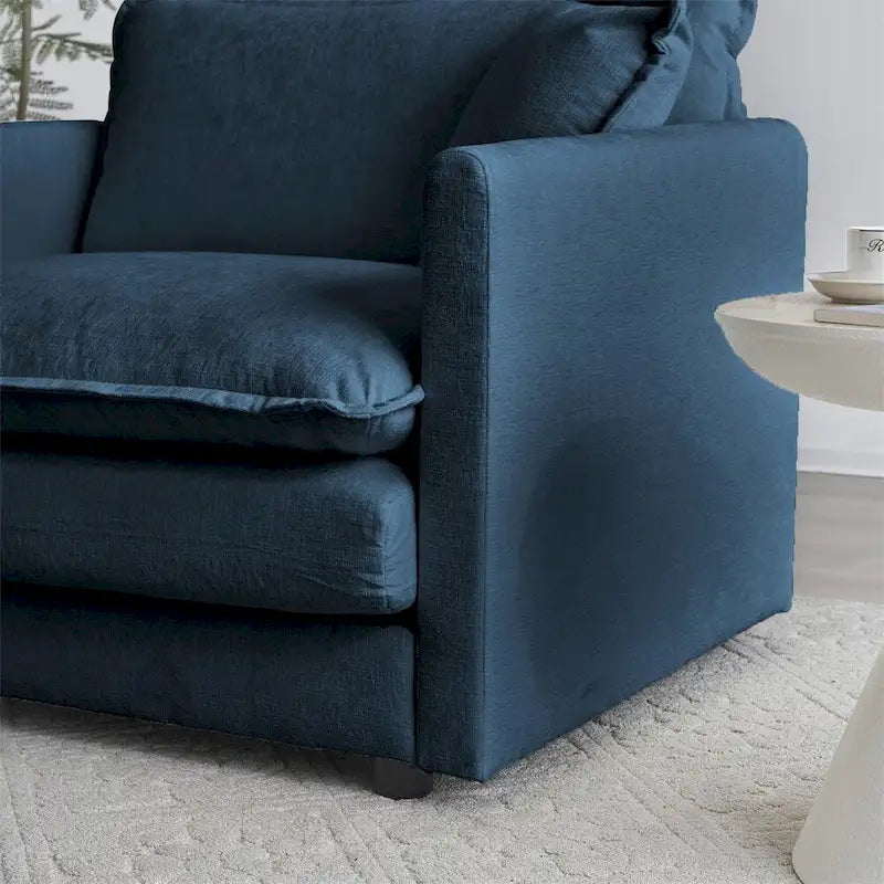 Ensemble de salon 2 pièces, comprenant un canapé deux places et un canapé rembourrés.